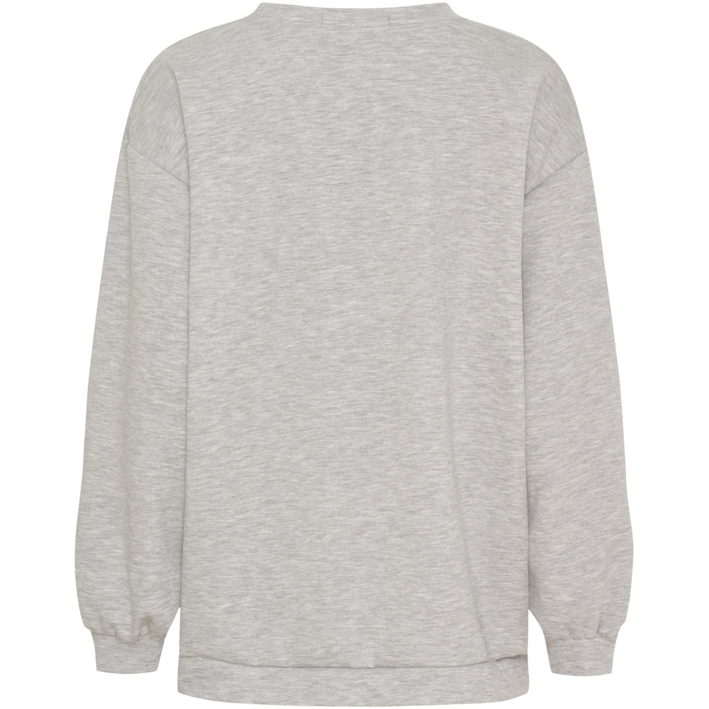 Bagside af Marta du Château Hibiscus Blå mønstret sweatshirt med rund hals og elastiske manchetter.