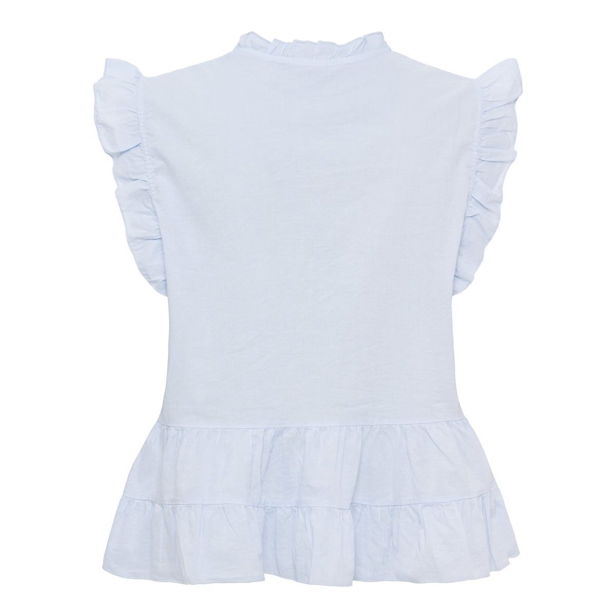 Emira-bluse i lyseblåt med flæset kant og fald, set bagfra. Fra Marta du Château.