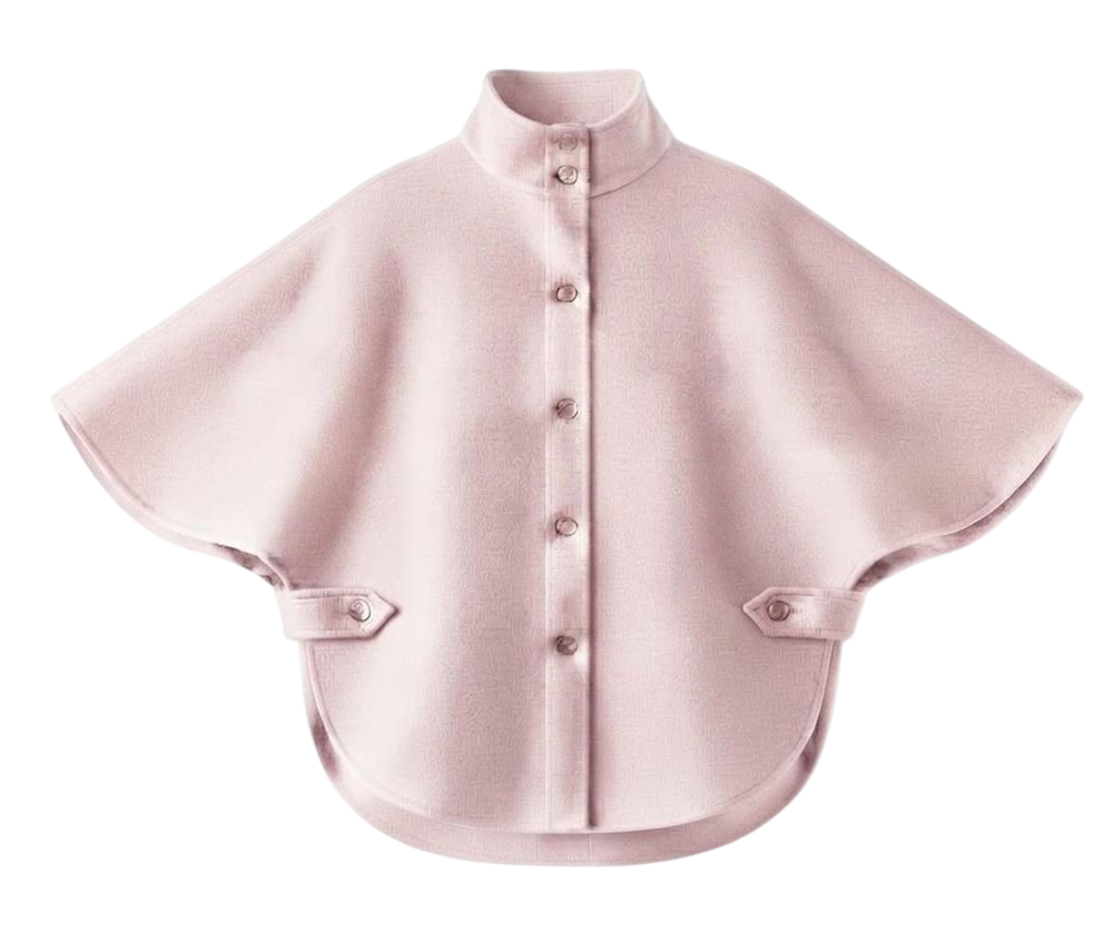 Kopenhaken Isla 2 Rosa poncho, lyserød med opretstående krave og stropper i siderne, vist på hvid baggrund.