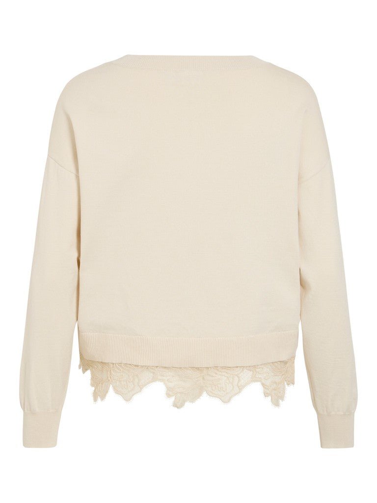 VILA 155175 Viodine Beige top med ribkant ved ærmerne og forneden samt elegant blonderkant forneden.