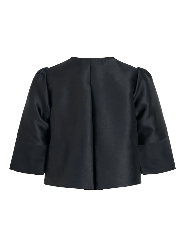 Bagfra set billede af en sort VILA 156214 VIKelsey Sort-blazer med lange ærmer, brede manchetter og en søm i midten.
