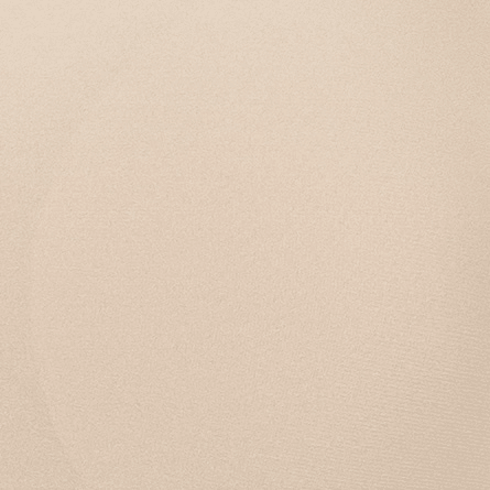 Nærbillede af et glat, lysbeige stof – såsom Chantelle Seamless Soft Stretch WU Sand 132102 fra Chantelle Seamless.